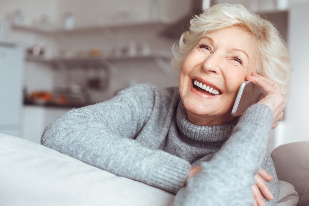 grandmother at home on phone