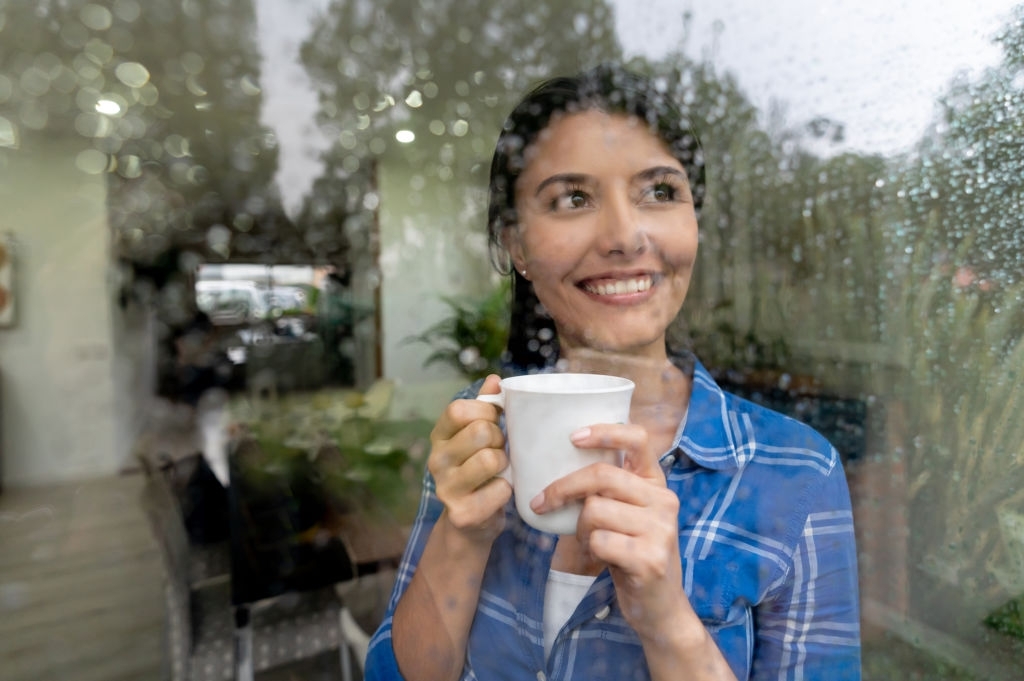 woman at home window