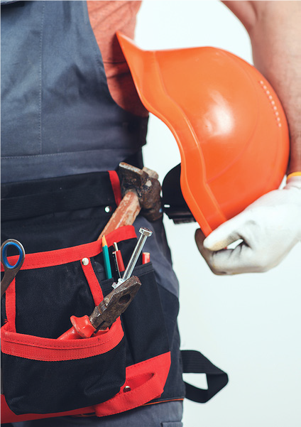 contractor with tool belt and hard hat