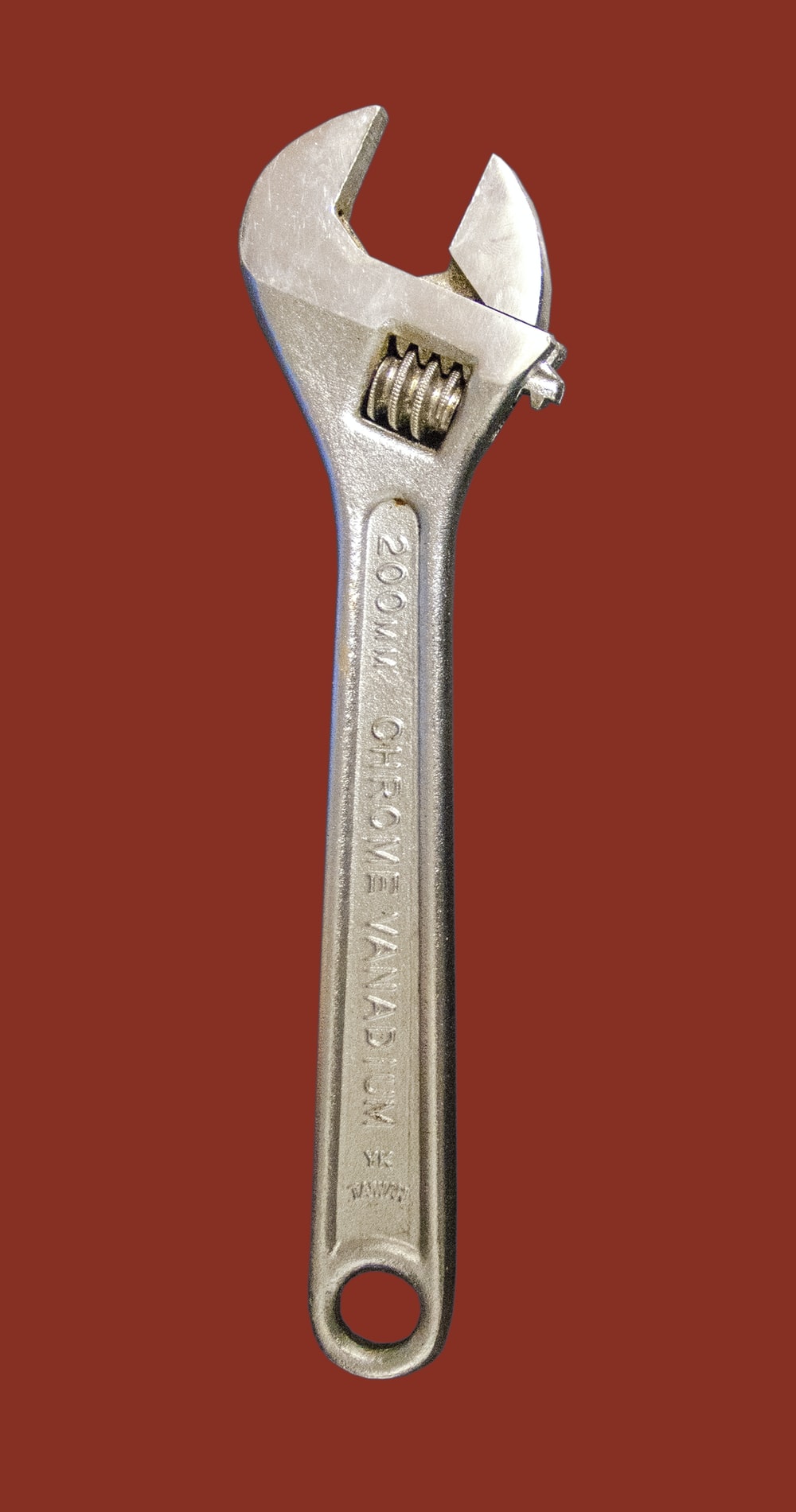 200mm wrench on red background