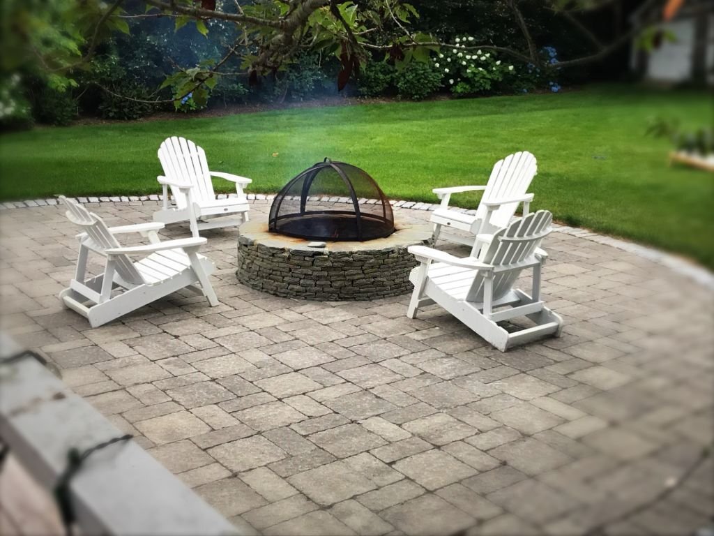 backyard paver patio with fire pit